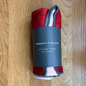 yoga towel Rodan and Fields logo red pink gray